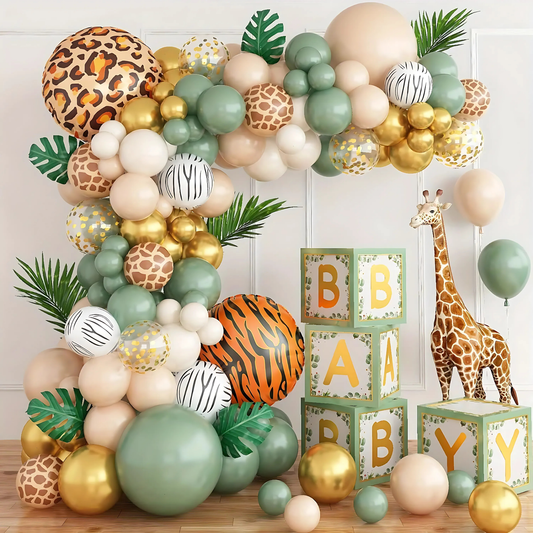 Stunning safari jungle balloon garland arch kit featuring leopard, zebra, giraffe, and tiger print balloons in green, beige, gold, and neutral tones, styled with baby blocks spelling "BABY" and a toy giraffe for a wild one baby shower or birthday party decoration.