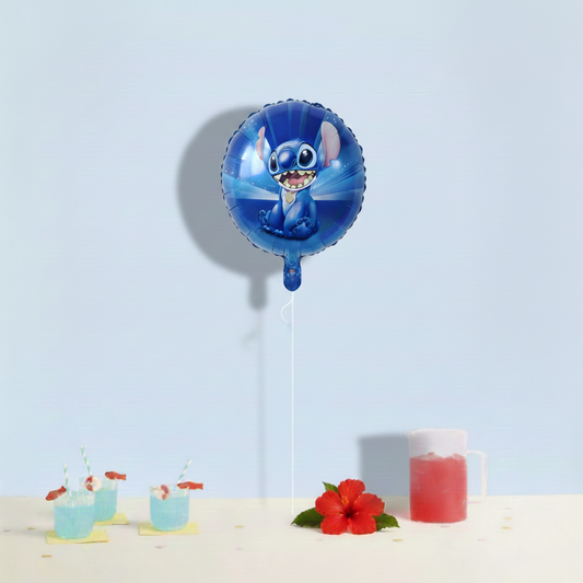 Blue balloon with cartoon character on a table with drinks and flowers against a light blue background